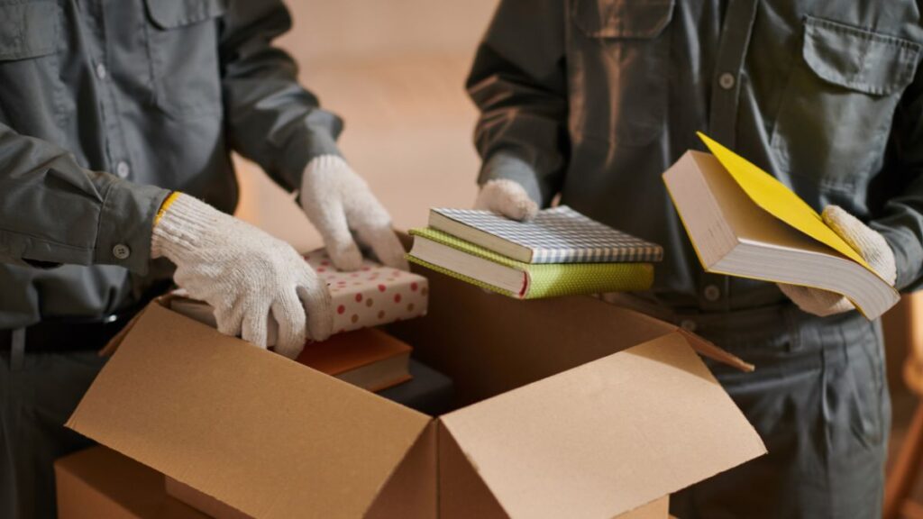 Professional movers NJ loading furniture safely into moving truck for jersey city moving company Tera Moving