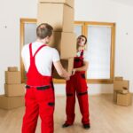 Top Jersey City movers packing and loading boxes