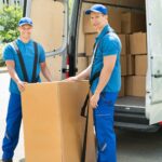 Top Jersey City movers packing furniture and boxes Moving service in New Jersey handling residential relocation Professional movers loading a truck in Jersey City