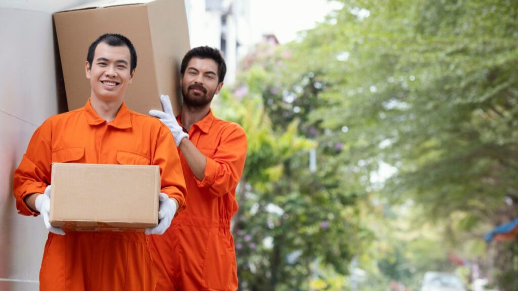 Moving companies in Newark NJ packing furniture Top Jersey City moving company handling local relocation Professional movers loading boxes in Newark NJ