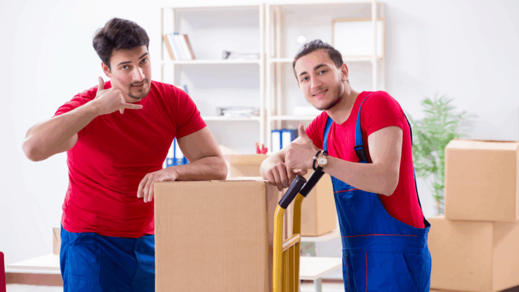 Professional local movers in NJ from a top Jersey City moving team carrying furniture into a new home