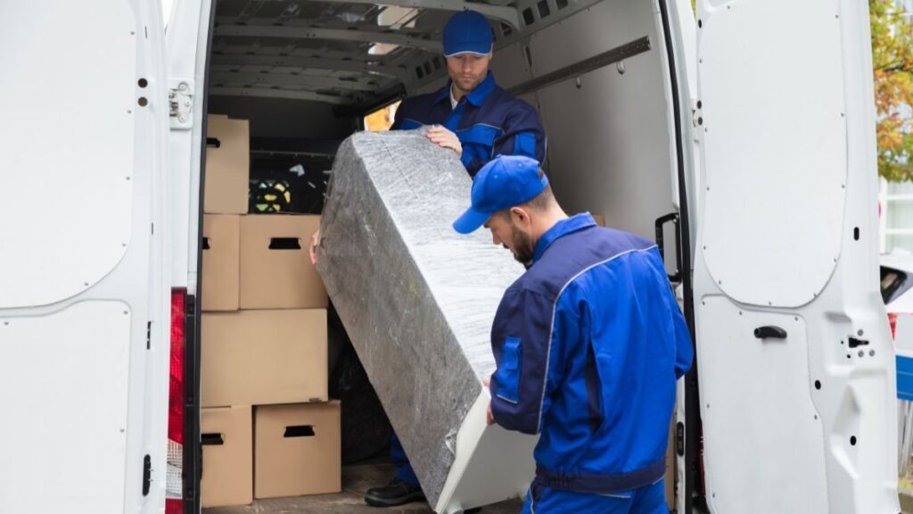 Top Jersey City moving company crew efficiently relocating office furniture with professional organization and care