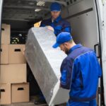 Top Jersey City moving company crew efficiently relocating office furniture with professional organization and care