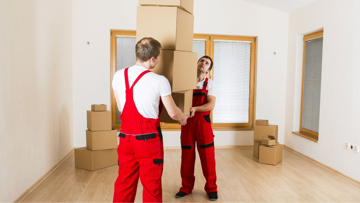 Jersey City movers packing fragile items into boxes